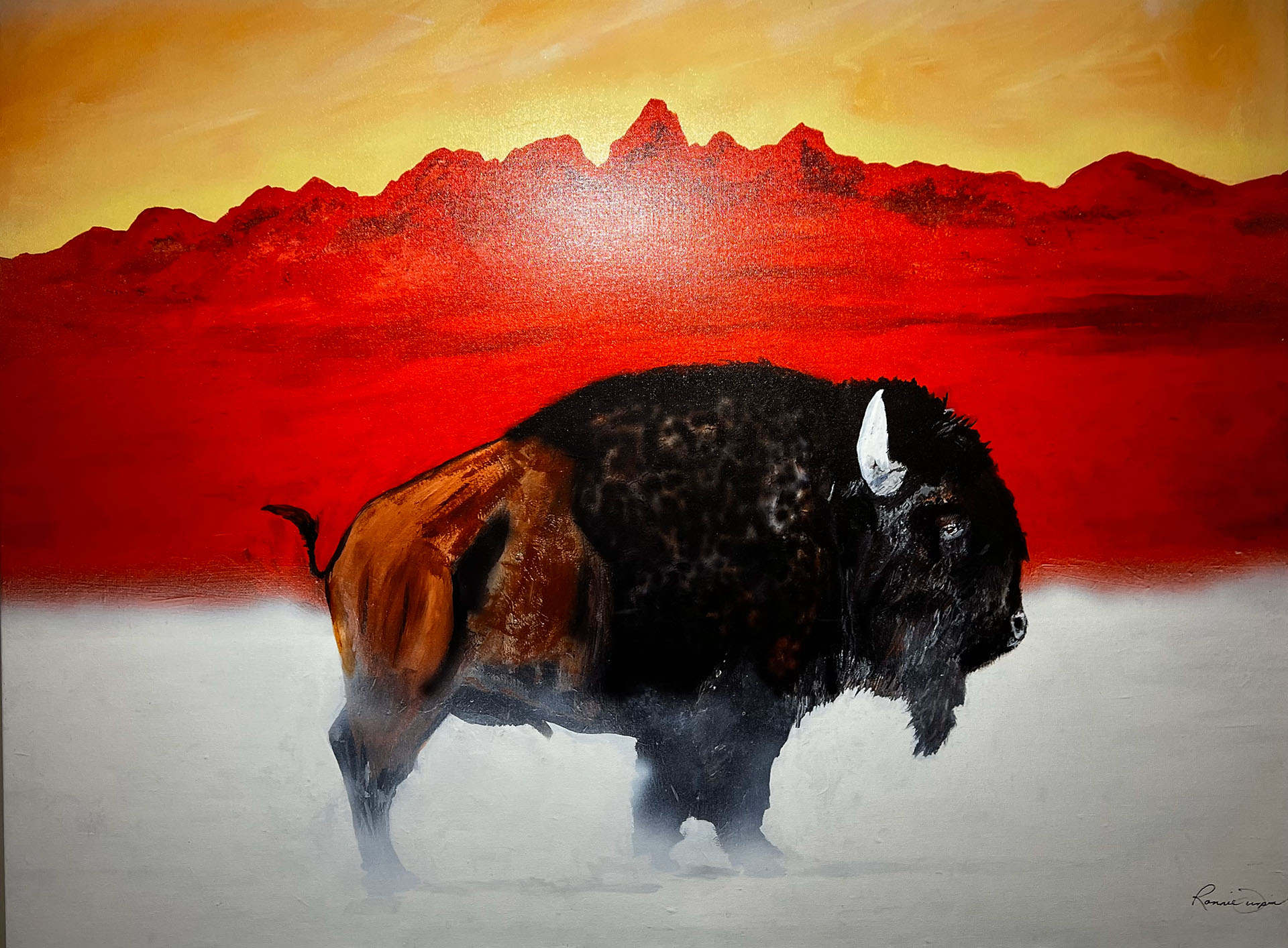 painting of red mountains and a buffalo